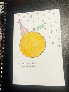 an orange birthday card with the words orange you glad it's your birthday on it