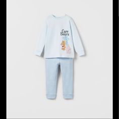 Two-Piece Pajamas. Round Neck Long Sleeve T-Shirt. Snap Button Closure At Shoulder. Elastic Waistband Leggings. Care Bears Tm Print. Size 12-18 Mo Zara Long Sleeve Loungewear Sets, Zara Home Baby, Elastic Waistband Leggings, Blue Suit Jacket, King Outfit, Baby Boy Knitting, Zara Boys, Baby Top, Zara Outfit