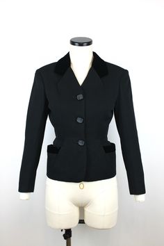 "Late 1940s - early 1950s Wool Jacket Origin: Nice, France Brand: Marie Therese  Marie Therese was a seamstress who executed Givenchy, Dior and her own designs for princess Grace Kelly.  Her pieces nowadays can be found in V&A and Met Museums. Fits like: EUR XS Measurements: Chest: 88cm/ 34,6\" Waist: 62cm /24,4\" Sleeve length: 54-57cm/ 21,3-22,4\" shoulder to shoulder 40cm/15,7\" Displayed on the mannequin with the measurements: 99-73-101cm (39- 28,7- 39,8\") Material: Wool Condition: Very Good, slight yellowing around the armpits on the lining of the jacket  THIS ITEM IS SENT WITH TRACKED SHIPPING" 1950s Fitted Workwear Outerwear, Vintage Black Semi-formal Outerwear, Black Vintage Semi-formal Outerwear, Vintage Black Notch Lapel Blazer, Vintage Black Blazer For Office, Fitted Retro Blazer For Semi-formal Occasions, Vintage Tailored Black Blazer, Tailored Vintage Suit For Evening, Vintage Fitted Evening Blazer