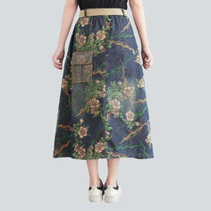 Introducing the 2023 Spring-Summer Collection's cargo pocket printed denim skirt ââ‚?the perfect combination of city mode and contemporary fashion!Why It's The Ideal Streetwear LookThis eye-catching denim skirt has it all ââ‚?from the long silhouette and high-waist cut to the unique painted pattern and cargo pockets. this piece is sure to turn heads. Not to mention. the resilient rubber closure ensures that you can rock any look with confidence and trend.Key Highlights: Painted Perfection: A uni