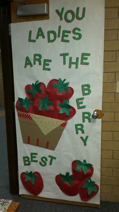 a door sign that says, you ladies are the berry best and is decorated with strawberries