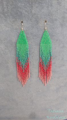 These handmade earrings are made of high-quality Czech beads and strong synthetic thread. They are elegant, fashionable, and highly versatile, suitable for everyday wear. There may be some color discrepancies which is due to the different monitor settings 100% hand made with love! Measurements: Length-about  11.5cm (4.52 inch) Width -about  2 cm (0.79 inch) Materials: Sterling silver components Czech glass beads Strong bead weaving thread Trendy Green Beaded Dangle Earrings, Handmade Trendy Red Tassel Earrings, Handmade Green Tassel Dangle Earrings, Green Tassel Drop Earrings With Colorful Beads, Green Handmade Tassel Dangle Earrings, Trendy Green Earrings With Colorful Beads, Green Drop Tassel Earrings For Beach, Adjustable Green Jewelry With Tassels, Green Tassel Drop Earrings For Beach