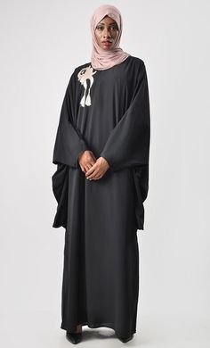 Loose Batwing Detail Abaya - Black - EastEssence.com Oversized Black Abaya, Oversized Long Sleeve Black Abaya, Oversized Black Long Sleeve Abaya, Black Oversized Long Abaya, Oversized Black Long Abaya, Black Long Sleeve Thobe For Evening, Festive Black Party Thobe, Black Long Sleeve Thobe For Party, Abaya Black