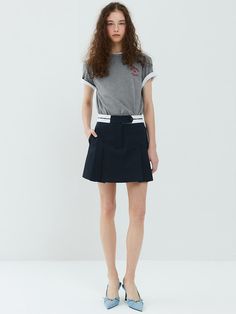 This soft skirt with the perfect pop of pretty.A smooth fabric with comfort stretch and a soft texture.Our fabric gives these skirt flexible comfort and it hugs your silhouette. - Lovely and cute mini skirt - Brand logo on the belt - Side zip closure and belt loops - Whether you add a tee or a blazer, you'll have plenty of pairing options with this chic style- It's soft and comfy with soft polyester blend Chic Stretch Skort With Mini Hem, Chic Mini Skort With Stretch, Stretch Mini Pleated Skirt For Workwear, Stretch Flared Skort For Work, Pleated Elastane Tennis Skirt, Pleated Tennis Skirt In Elastane, Mini Length Elastane Pleated Skirt, Relaxed Fit Mini Pleated Skirt For Workwear, Pleated Elastane Mini Tennis Skirt