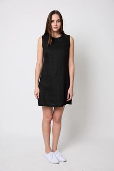 Sleeveless, A-Line shape. French darts and back darts for fitted shape. Patch pockets on front. Invisible zipper and fully lined in black linen. 100% Linen. Imported. Model wears size SMALL. She's 5'10" 33' Bust 26" waist 37" hip. Dress length from center front neck to hem is 31". Hip Dress, Strap Tops, Black Linen, Summer 2019, Invisible Zipper, Dress Length, Sweater Top, A Line, Top Outfits