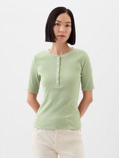 Fitted Henley Neckline Top For Everyday, Casual Henley With Button Closure And Crew Neck, Casual Stretch T-shirt With Button Closure, Casual Fitted Henley Neckline Top, Stretch Cotton Tops With Henley Neckline, Casual Henley With Buttons And Crew Neck, Spring Fitted Henley With Henley Neckline, Casual Stretch Top With Henley Neckline, Spring Casual Henley With Button Closure