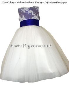 a white and blue flower girl dress