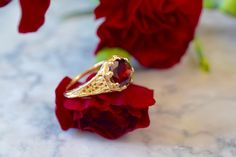 Metal: 14kt Yellow Gold Stone: Garnet Shape: Round Garnet Weight: 1.65 ctw Ring Size: 5 1/2 Sizing: Please state ring size in the personalization box. Weight of entire piece with stones: 3.50grams Width Of Top Part Of Ring : 10mm Customization: We can custom make this ring with any gems and metals. Please inquire if interested. White Gold Amethyst Version: https://www.etsy.com/listing/231479258/sale-vintage-style-14k-white-gold?ref=shop_home_active_7&frs=1 Rose Gold Aquamarine Version: https Elegant Yellow Gold Ruby Ring With Intricate Design, Yellow Gold Filigree Ring For Gift, Ruby Filigree Wedding Ring, 14k Gold Filigree Ring With Intricate Design Gift, Yellow Gold Ruby Ring With Intricate Design As Gift, 14k Gold Filigree Ruby Ring Gift, 14k Gold Ruby Ring With Filigree For Gift, Elegant 14k Stamped Ruby Wedding Ring, Elegant 14k Stamped Ruby Ring For Wedding