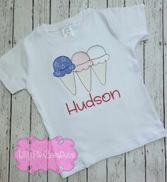 Celebrate the 4th of July with this playful Popsicle Trio Kids T-shirt! Embroidered with patriotic red, white, and blue ice cream cones, this customizable tee is perfect for boys or girls. Personalize it and add some fun to your holiday celebrations! All of my items are made to order, choose your shirt type, size and thread colors and I will make a custom shirt just for you! Playful Embroidered Short Sleeve Tops, Playful Embroidered Cotton T-shirt, Embroidered Birthday T-shirt, 4th Of July Ice Cream, Girls Ruffle Shorts, Blue Ice Cream, Body Suit With Shorts, Ice Cream Cones, Applique Shirts