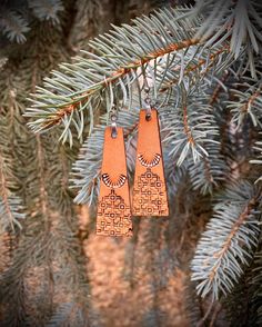 Hand tooled, hand stamped, and hand painted. Made with genuine Hermann Oak veg tan leather. Our earrings are feminine yet rustic, inspired by the raw untamed beauty of Montana.  Stainless steel hooks. Very light weight. One sided design. Approximate size: 2" x 5/8" Thank you for supporting my small business!  Please message me with any questions or requests! - Jordan @IronHorseTradingCo Painted Leather Earrings, Montana Western, Rectangle Earrings, Veg Tan Leather, Painting Leather, Western Jewelry, Leather Earrings, Jewelry Handmade, Hand Tools