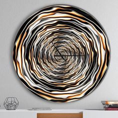 a wall clock with an abstract design on it