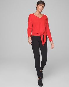 Why you’ll love it: A vertical seam detail leads to an off-center tie front that adds shape and style to this soft sweater—perfect for spring and summer. Details V-neck. Long sleeves. Front side tie. Side slits. 27" from shoulder to hem in front; 29" in back. 55% cotton, 45% nylon. Machine wash cold. Imported. Casual V-neck Top With Tie Sleeves, Casual Tops With Tie Waist For Loungewear, Spring Stretch Tops With Tie Waist, Casual Spring Top With Knot Detail, Casual Tops With Knot Detail For Spring, Casual Knot Detail Top For Spring, Casual Spring Tops With Knot Detail, Casual V-neck Top With Tie Waist, Versatile Spring Top With Tie Sleeves