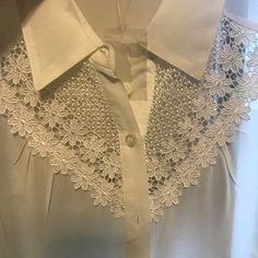 White Blouse With Nice Embroidery. Size Medium. It Has No Stains, No Holes, No Rips And No Pilling. The Blouse Is New But I Removed The Tags Thinking That I Would Wear It, You Can Still See Part Of The Tag In It. Blouse Is Very See Through On The Non-Embroidery Part. Summer Collared Lace Tops, Collared Lace Tops For Summer, Collared Lace Blouse With Lace Top, Summer Lace Collared Tops, Summer Collared Lace Blouse, Collared Lace Tops For Spring, Collared Lace Blouse For Summer, Summer Lace Blouse With Collar, Lace Collared Tops For Spring