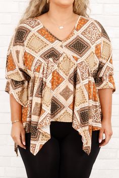 Part office-chic, part boho-chic, this top is the perfect choice for the season! Featuring a gorgeous geometric, floral pattern set against a bold, season-appropriate hue, this lovely top is sure to make a statement in any setting! 95% Polyester, 5% Spandex Patterned V-neck Rayon Tops, Patterned Abstract Print V-neck Top, Patterned Flowy V-neck Blouse, Patterned Long Sleeve Top With Mixed Print, Long Sleeve Patterned Top With Mixed Print, Printed Blouse For Fall Vacation, Bohemian V-neck Top With Colorful Pattern, Chic Spring Tops With Geometric Pattern, Vacation Rayon Blouse For Fall