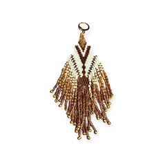 a brown and white beaded keychain hanging from a metal hook on a white background