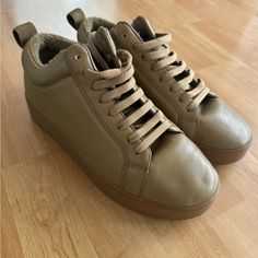 Used Bottega Veneta Tan/Brown Leather Sneakers In Excellent Condition! Includes Original Dust Bags And Box Beige Leather High-top Sneakers With Textured Sole, Khaki Round Toe Sneakers For Fall, Fall Khaki Sneakers With Round Toe, Khaki Leather Sneakers With Cushioned Footbed, Brown High-top Sneakers With Leather Sole And Round Toe, Brown Leather High-top Sneakers For Fall, Brown High-top Sneakers With Leather Sole, Leather Khaki Sneakers For Fall, Khaki Leather Sneakers For Fall