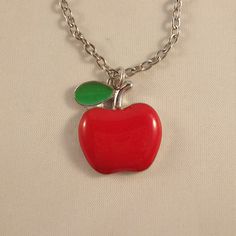 This Beautiful Hand Painted Enamel Red Apple Pendant Necklace Is Made Of Tibetan Silver. Brand New And Never Been Worn And Is Hypoallergenic. This Fine Quality Necklace Is Perfect And Comfortable For All Day Everyday Wear Or A Special Gift. Get An $18 Gift Of Your Choice In My Listings With Purchase Of Two Or More Items. Please Send Offers And Questions. Material: Silver Alloy, Enamel Chain: 20" With Lobster Clasp Charm: 23x20mm Or .90"X.78" Apple Jewelry, Apple Necklace, Pearl Necklace Vintage, Turquoise Pendant Necklace, All Day Everyday, Long Chain Necklace, Genuine Turquoise, Vintage Pearls, Leaf Necklace