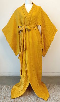 This dreamy handmade kimono style robe is insanely comfortable and effortlessly chic. The robe is voluminous and adjustable, with a long belt to tie the garment as tightly or loosely as desired. Traditional vents underneath the arms allow for extra aeration and room for the bust. The garment cam also be worn as a duster style jacket! The cotton double gauze fabric is lightweight yet warm, airy, and wonderfully soft.  Care: Machine wash gentle cold, Non-chlorine bleach, reshape, lay flat, cool iron Chartreuse Silk Robe, Chic Long Robe For Loungewear, Chic Long Loungewear Robe, Daywear Kimono With Tie Waist And Kimono Sleeves, Chic Kimono With Tie Waist And Kimono Sleeves, Long Loungewear Robe With Tie Waist, Long Robe With Tie Waist For Loungewear, Lounge Robe With Kimono Sleeves And Tie Waist, Belted Wrap Kimono For Loungewear