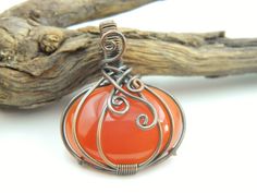 You will receive 1 pcs of Carnelian Pumpkin Pendent Copper Wire Wrapped pendant Halloween Healing Necklace Filigree Art Wire Wrap pendant Gemstone jewelry. Stone : Carnelian Pendant Size: 34 mm long include bail . Many thanks for you visit my store ♥ if you have any question please contact us. For wholesale Price Please Convo me. You can order different items as many you like . Orange Round Pendant Jewelry As Gift, Orange Round Pendant For Jewelry Making, Orange Round Pendant Jewelry For Gift, Orange Necklace For Halloween Gift, Orange Round Pendant Jewelry Gift, Orange Necklace With Large Pendant For Gift, Pumpkin Wire Wrap, Handmade Halloween Necklace, Gold Wire Wrapped Carnelian Jewelry