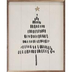 a wooden frame with a christmas tree drawn on it