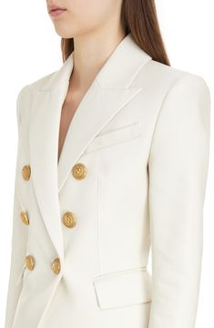 Golden lion-embossed buttons add signature embellishment to the front of a double-breasted leather blazer tailored with sharp shoulders and peaked lapels. 25" length (size 40) Double-breasted button closure Peaked lapels Five-button cuffs Chest welt pocket; front flap pockets Lined Leather Professional leather clean Imported Designer Clothing Designer Double-breasted Blazer With Lapel Collar, Designer Double Button Blazer With Lapel Collar, Designer Double-breasted Blazer With Hidden Buttons, Luxury Long Sleeve Blazer Dress With Double Button, Luxury Double-breasted Blazer With Button Closure, Luxury Double-breasted Outerwear For Evening, Luxury Double-breasted Evening Outerwear, Luxury Long Sleeve Double-breasted Blazer, Luxury Long Sleeve Blazer Dress With Button Closure