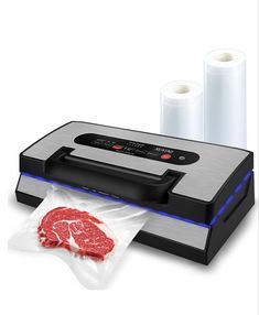 an image of a meat vacuumer and two rolls of paper