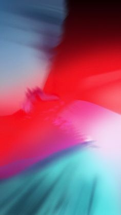 blurry photograph of an iphone screen with red and blue colors