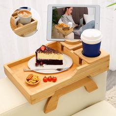 a wooden tray with a slice of cake on it and a cup of coffee next to it