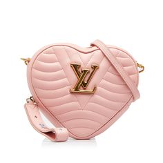 This elegant Louis Vuitton New Wave Heart Bag has a heart-shaped body that is made of a pink quilted leather body. On the front of the Bag is the signature LV logo plaque. The Bag features an adjustable, detachable shoulder strap with gold-tone hardware, a leather wrist strap, a top zipper closure and an interior slip pocket. The Bag can be worn loosely over the shoulder. Louis Vuitton New, Lv Logo, Louis Vuitton Pink, Louis Vuitton Crossbody, Heart Bag, Body On, Handbag Wallet, Wallet Accessories, Vuitton Bag