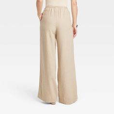 These High-Rise Wide-Leg Linen Pull-On Pants from A New Day™ make a great pick for warm-weather wear. Fashioned in comfortable wide-leg silhouette, they bring relaxed style to your look. The functional drawstring on the pull-on waist lets you get the perfect fit with every wear, and the functional pockets provide space for on-the-go essentials. A New Day™: Style that goes wherever you do. Weather Wear, Womens Clothing Sizes, Pull On Pants, Relaxed Style, A New Day, Warm Weather, Jumpsuits For Women, New Day, New Color