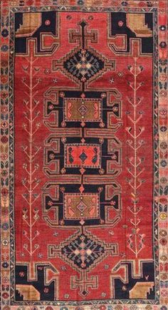 an antique persian rug with geometric design