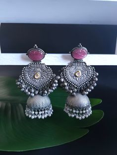 Around 3 inches Brass made Top is polished or coated with pure silver Note if u are in Instagram please visit website for more pics Temple Jewelry Metal Earrings With Tilla, Bohemian Silver Dual-tone Earrings, Silver Metal Jhumkas With Latkans, Handmade Silver Fusion Style Jhumkas, Silver Dual-tone Chandbali Earrings, Handmade Silver Metal Jhumkas, Handmade Silver Fusion Jhumkas, Silver Fusion Jhumkas With Latkans, Silver Fusion Style Jhumkas With Latkans