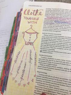 an open bible with the words collie yourself with love written on it and a drawing of a wedding dress