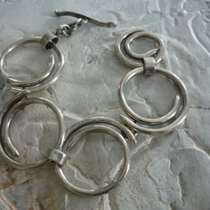 Sterling Silver Bracelet, Organic Sterling Silver Bracelet, Large Circles Bracelet, Wide Silver Bracelet, Chunky Circles Bracelet K77 - Etsy Contemporary Sterling Silver Bracelet, Modernist Sterling Silver Oyster Bracelet, Contemporary Sterling Silver Bracelet With Polished Finish, Modernist Hallmarked Sterling Silver Bracelets, Contemporary Polished Sterling Silver Bracelet, Modernist Hallmarked Sterling Silver Bracelet, Modern Sterling Silver Round Chain Bracelet, Contemporary Sterling Silver Bracelet In Silver, Modern Nickel-free Sterling Silver Bracelet