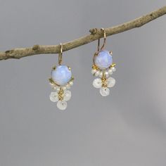 Delicate Gemstone Drop Earrings, Natural Stones Drop Earrings For Wedding, Delicate Gemstone Earrings For Wedding, Elegant Moonstone Dangle Crystal Earrings, Elegant Moonstone Teardrop Earrings, Elegant Gold Crystal Earrings With Moonstone, White Pearl Earrings With Natural Stones For Wedding, White Natural Stone Pearl Earrings For Wedding, Elegant Moonstone Earrings With Natural Stones