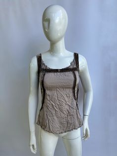 Vintage tank top by Marithe Francois Girbaud. Crumple effect. The back is longer than the front. It fastens on the side with a zipper. Size D36 USA27 F38 tag, fits XS-M Condition 9/10  Made in Italy Underarm to underarm -  cm/ " Strapless front length  - cm/ " 📍 follow the shop on Instagram: @𝚔𝚘𝚛𝚊𝚛𝚎_𝚟𝚒𝚗𝚝𝚊𝚐𝚎 All measurements taken with garment lying flat.  Vintage sizes vary greatly! We recommend comparing measurements with a similar style garment you own for best fit! If you have a Y2k Fitted Sleeveless Tank Top, Fitted Y2k Sleeveless Tank Top, Y2k Style Stretch Vest Top, Stretch Y2k Vest Top, Y2k Stretch Vest Top, Fitted Y2k Cami Tank Top, Y2k Tank Top Vest, Fitted Y2k Style Tank Top With Scoop Neck, Fitted Y2k Tank Top With Scoop Neck