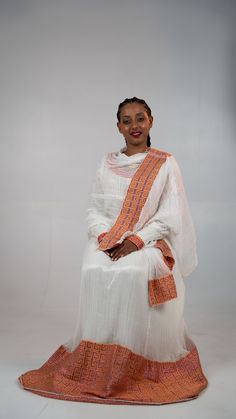 A timeless Ethiopian dress. The dress is hand embroidered and hand woven. The vibrant Ethiopian tilet will be a great addition to your habesha dress collection.  *The dress is made to order, please include your size when you place your order.  *Please include your phone number with your address. It's required on the shipping form. Ethiopian Dress, Dress Clothes For Women, Dress Collection, Hand Embroidered, Hand Weaving, Dress Outfits, Clothes For Women, Dresses, Clothes