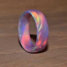 Nebula Opal, or Oparex, is a heat-hardened resin with a mixture of silica. Different from lab-grown synthetic opal with high silica percentage, it only contains 25% silica. We can create this ring in almost any color you desire, simply add a note in the cart at checkout and we will find the customization right for you. HOW RINGS ARE MADE Each ring is custom cut using a diamond bit and lapped to your ring size using a lathe and jeweler's mandrill, the inside and outside of the ring are sanded and Gothic Viking, Synthetic Opal, Dope Jewelry, Opal Ring