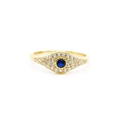 Luck never looked so good. This Evil Eye ring is a symbol of luck and protection, and needs to be featured in your daily ring stack! 14k gold plated sterling silver Clear crystals with a sapphire center stone Gold Sapphire Crystal Ring, Gold Sapphire Jewelry For Promise, Gold Sterling Silver Sapphire Promise Ring, Gold Sapphire Ring In Sterling Silver For Promise, Yellow Gold Evil Eye Round Ring, Spiritual Gold Crystal Ring In Sterling Silver, Yellow Gold Spiritual Crystal Promise Ring, Spiritual Yellow Gold Crystal Promise Ring, Yellow Gold Spiritual Promise Ring