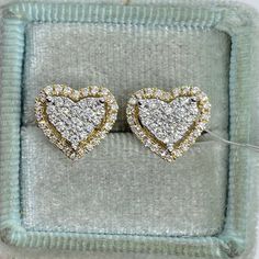 Beautiful Heart Shape Diamond Earrings Yellow Gold.  Excellent craftsmanship, all diamonds are set smooth and sparkles tons.  Sits nice on the ear, not too big or small.  Set with minimal prongs showing, very pretty shape.  About 10mm.   The large push backings holds tightly for a secure fit.   Genuine Round Brilliant Cut Diamonds Total weight: 0.67 Carats  Clarity: SI/I Color: F/G qAll white and shiny diamonds, no cloudy or yellowish stones  Solid 14K Yellow Gold 4.28 grams Comes with gift box Heart-shaped Diamond Cut Earrings For Gift, Heart-shaped Diamond Earrings In 14k Gold, Luxury Heart-shaped Yellow Gold Diamond Earrings, Yellow Gold Heart-shaped Diamond Earrings, 14k Gold Heart-shaped Diamond Cut Earrings, Heart Shaped Diamond Earrings, Heart Diamond Earrings, Heart Diamond, Heart Stud Earrings