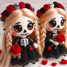 two dolls with long blonde hair and red roses