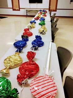 the table is lined up with candy bags