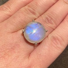 This Stunning 7+Ct Natural Rainbow Moonstone Round Solid Sterling Silver Ring, Stamped 925 Is World Class! The Composition Of The Stone Is Gorgeous Which Creates A Lot Of Rainbow Color Flare. Please Checkout The Info I’ve Provided In Photos On What Gives Natural Moonstones Their Desired Flashy Color. White Gold Round Cabochon Gemstones, White Gold Sterling Silver Gemstones With Round Stone, Silver Gemstones With Large Round Stone, Moonstone Jewelry With Large Round Stone, Fine Jewelry Sterling Silver Moonstone Ring, Round Moonstone Jewelry With Large Stone, Fine Jewelry White Gold Moonstone Cabochon Ring, Sterling Silver Cabochon Moonstone Ring For Anniversary, Anniversary Sterling Silver Cabochon Moonstone Ring