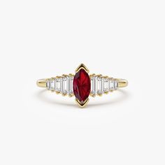 Celebrate your love with our 14K Gold Engagement Ring, a stunning choice for everyday elegance. This ring features a marquise-cut ruby adorned with baguette accent stones, making it an exquisite choice for anniversaries and a bold representation of July's birthstone. Elevate your style with this July Birthstone Statement Band, a symbol of passion and enduring love that adds a touch of timeless beauty to any ensemble. ▶Features: * Made to Order * Gold Kt: 14K Solid Gold (also available in 18K) * Available Gold Colors: Rose Gold, Yellow Gold, White Gold * Width: 8.9MM * Height: 4MM * Marquise Ruby: 1 pc 7 x 3.5 MM  * Baguette Diamonds: 10 Pcs 1.75 - 3.5 x 1.2 -1.5MM * Diamond Weight: 0.30 ctw * Ruby Carat Weight: 0.48 ctw * Color and Clarity: G Color VS2 Clarity ▶ See more of our Ruby Jewelr Gold Ruby Ring, July Birthstone Ring, Jewelry Ruby, Ruby Ring Gold, Ring Everyday, Ring Marquise, Gold Armband, Enduring Love, Baguette Diamonds