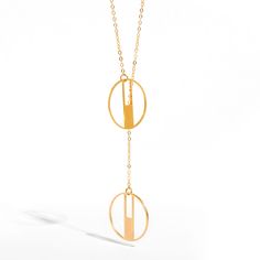 Art Deco-inspired adjustable lariat necklace featuring 2 small round pendants on a long, gold-filled cable chain. This 30" (72 cm) necklace does not have a clasp, as it is wide enough to fit around your head and can be adjusted to the desired position by gently sliding the pendants up or down.- Pendants: gold plated brass- Chain is 30" long (72 cm)- Chain: 14K gold filled or sterling silver- Dimensions: pendants measure approximately 0.8" x 0.8" (20 mm x 20mm) Modern Gold Jewelry With Adjustable Length, Modern Rose Gold Necklace With Adjustable Chain, Modern Charm Necklaces With Adjustable Chain And Round Pendant, Modern Charm Necklace With Round Pendant And Adjustable Chain, Modern Charm Necklace With Adjustable Chain And Round Pendant, Modern Gold Long Drop Necklace, Modern Circular Rose Gold Jewelry, Rose Gold Lariat Necklace With Adjustable Chain, Brass Lariat Chain Necklace