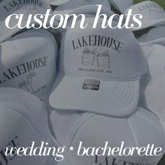 wedding hats with the words lakehouse on them in front of a pile of other hats