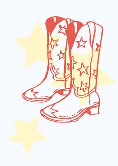 a pair of cowboy boots sitting on top of each other in front of star shaped stars