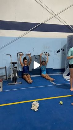 three women doing exercises in a gym