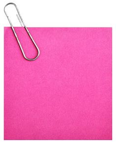 a pink paper with a metal clip attached to the side on a white background photo