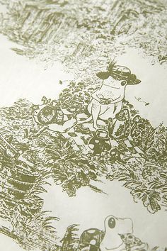 an image of the back side of a paper with plants and animals drawn on it